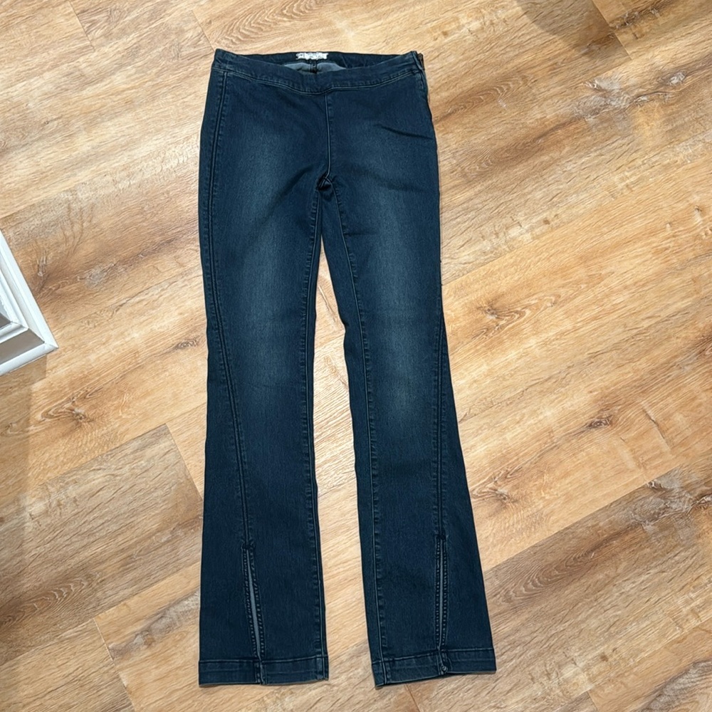 Free People flare denim. Size 27. Flare leg with opening. Dark blue wash.